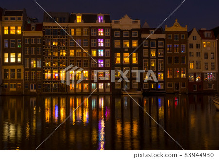 Houses on the Amsterdam Canal at Night Houses on the Amsterdam Canal at Night 83944930