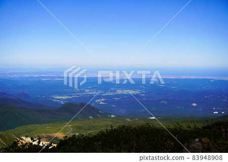 The Pacific Ocean and surrounding towns overlooking the Zao mountain climbing course The Pacific Ocean and surrounding towns overlooking the Zao mountain climbing course 83948908