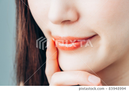Young lady's lips 83948994