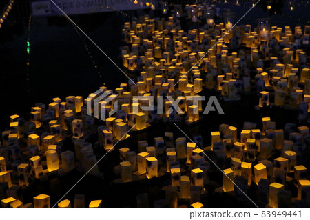 A ship floating event with a mini-ELE day light bulb on the pond A ship floating event with a mini-ELE day light bulb on the pond 83949441