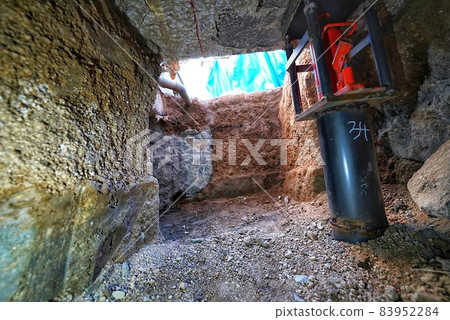 Jack up due to land subsidence of a house Jack up due to land subsidence of a house 83952284