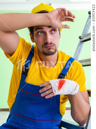 Injured worker at the work site Injured worker at the work site 83953422
