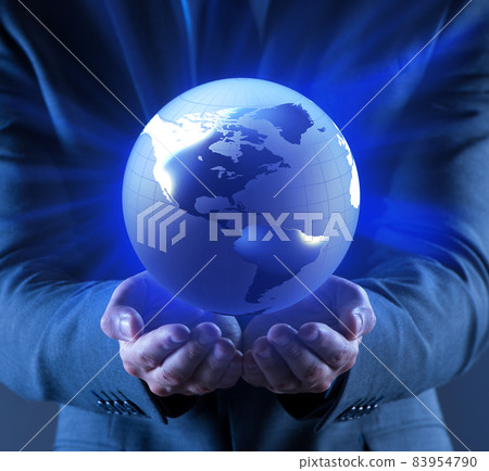 Businessman holding globe in global business concept 83954790