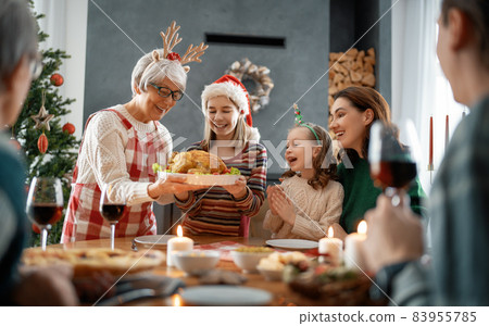 family celebrating Christmas family celebrating Christmas 83955785