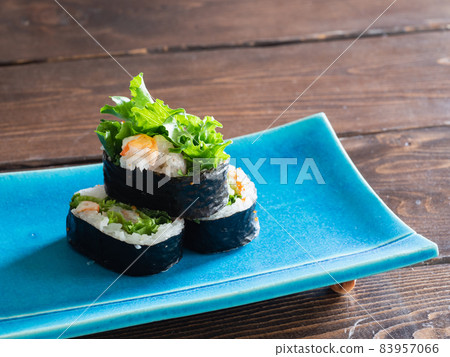 Shrimp salad roll with shrimp, lettuce and vinegared rice wrapped in seaweed. Shrimp salad roll with shrimp, lettuce and vinegared rice wrapped in seaweed. 83957066