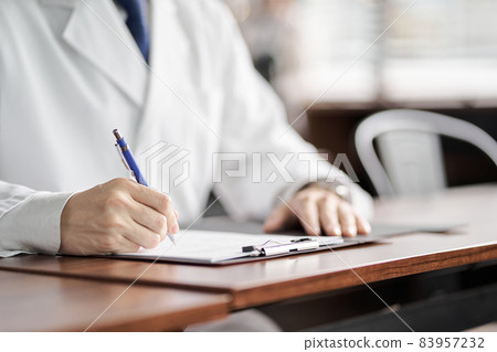 Hands of medical personnel attending the seminar Hands of medical personnel attending the seminar 83957232