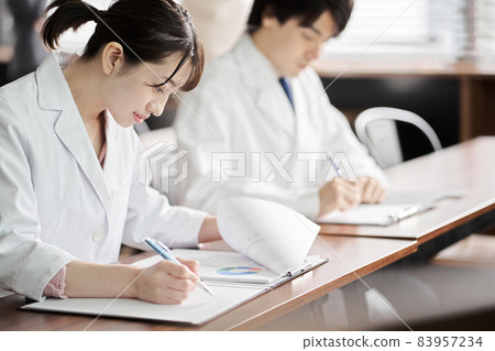 Medical personnel attending seminars Medical personnel attending seminars 83957234