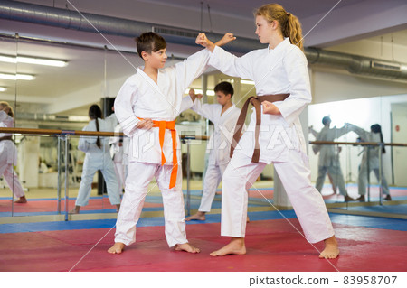 Karate kids training in gym 83958707