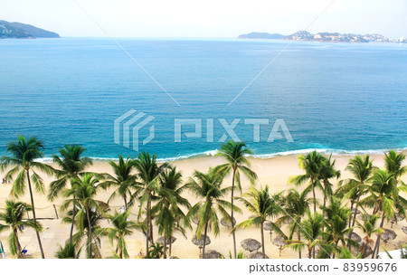 Ocean waves and beach, Acapulco, Mexico 83959676