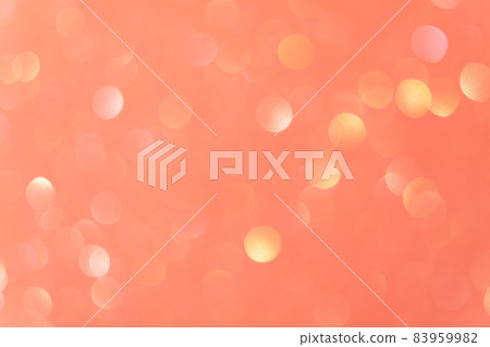 Bokeh light overlay. Glowing circles. Festive sparks. Flash effect filter. Defocused pastel yellow pink round flecks on peach orange abstract background. 83959982