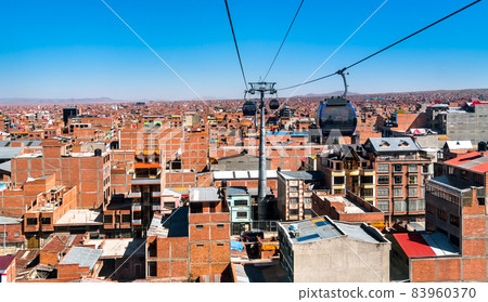 Cable car above El Alto in Bolivia Cable car above El Alto in Bolivia 83960370