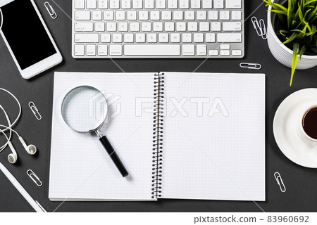 Top view of modern workplace with tablet computer Top view of modern workplace with tablet computer 83960692