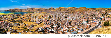 Panorama of Puno with Lake Titicaca in Peru 83961512