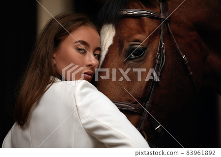portrait beautiful woman long hair next horse 83961892