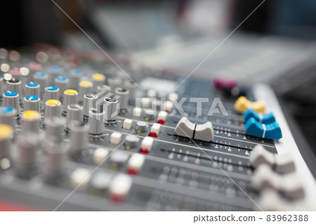 Sound mixer in radio broadcasting and music recording studio 83962388