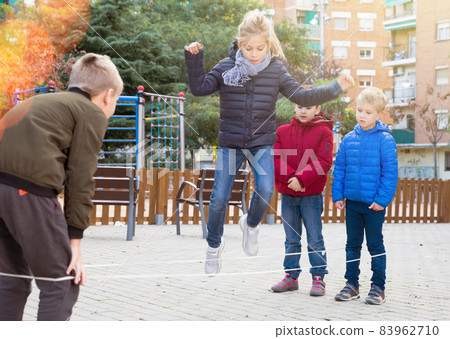 Children playing chinese jump rope Children playing chinese jump rope 83962710