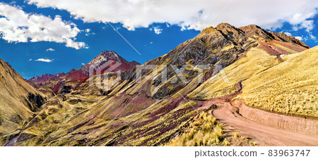 Pallay Punchu of Apu Takllo Rainbow Mountains in Peru Pallay Punchu of Apu Takllo Rainbow Mountains in Peru 83963747