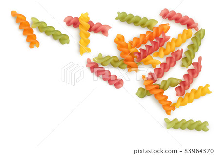 raw Fusilli colored pasta, isolated on white background with clipping path. Top view with copy space for your text. Flat lay raw Fusilli colored pasta, isolated on white background with clipping path. Top view with copy space for your text. Flat lay 83964370