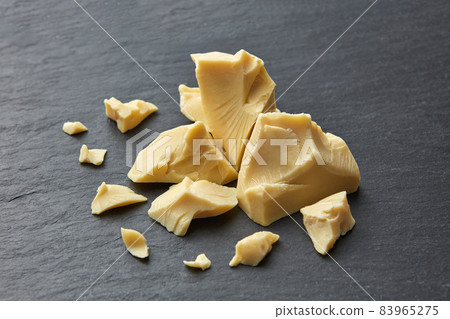Rough pieces of organic cocoa butter 83965275