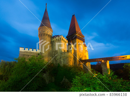 Corvin Castle in night lights, Romania 83966138