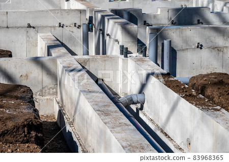 Construction work Piping and foundation concrete Construction work Piping and foundation concrete 83968365