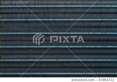 blue hydrophilic coaterd heat radiator - air conditioner evaporator close-up coil texture 83968722