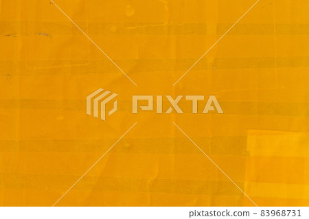 yellow sticky tape wrapped flat surface texture and close-up background yellow sticky tape wrapped flat surface texture and close-up background 83968731