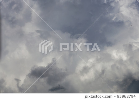 gray incoming storm clouds dark closeup backdrop gray incoming storm clouds dark closeup backdrop 83968794