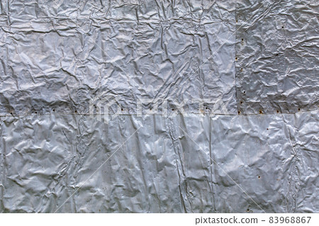 crumpled thick aluminium foil wall insulation surface texture and background crumpled thick aluminium foil wall insulation surface texture and background 83968867