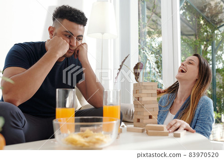 Woman Celebrating Victory in Game Woman Celebrating Victory in Game 83970520