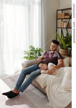 Man Stroking Head of Girlfriend Man Stroking Head of Girlfriend 83970597