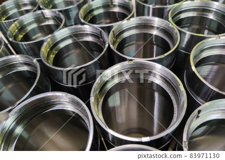 a close-up shot of shiny steel aerospace cnc turned tubes in a batch with selective focus and background blur a close-up shot of shiny steel aerospace cnc turned tubes in a batch with selective focus and background blur 83971130