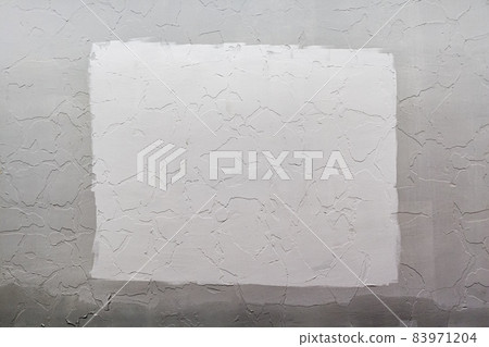Gray plaster wall background with white rectangle in center, Mockup. Gray plaster wall background with white rectangle in center, Mockup. 83971204