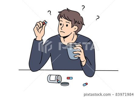 Confused man think of taking pills  83971984