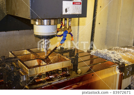 The CNC milling machine cutting the vacuum mold parts with oil coolant method. The CNC milling machine cutting the vacuum mold parts with oil coolant method. 83972671