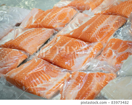 Frozen salmon fillet in plastic packing for sell  83973482