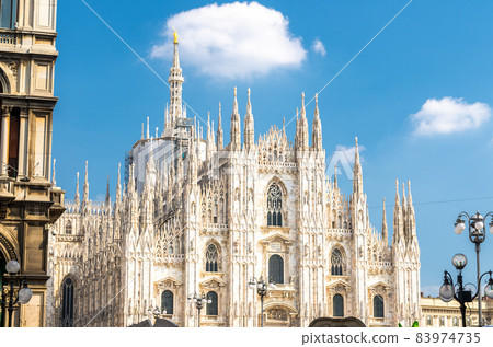 Duomo di Milano cathedral on Piazza del Duomo square, Milan, Italy Duomo di Milano cathedral on Piazza del Duomo square, Milan, Italy 83974735