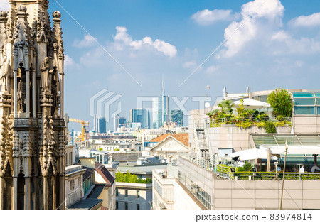 White marble statues on roof of Duomo di Milano Cathedral, Italy White marble statues on roof of Duomo di Milano Cathedral, Italy 83974814