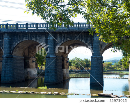 Dongan arch bridge is a stone arch bridge in Hsinchu, Taiwan. Dongan arch bridge is a stone arch bridge in Hsinchu, Taiwan. 83975015