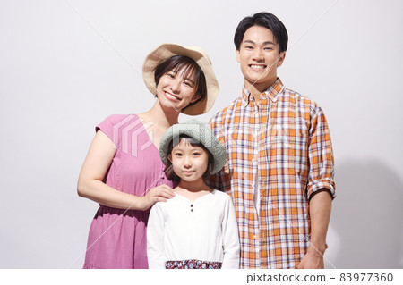 Portrait of a family of three with a smile Portrait of a family of three with a smile 83977360