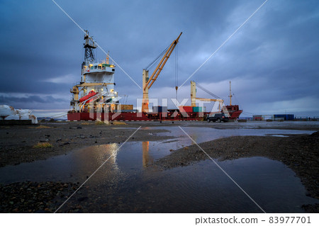 Cargo ship moored at the pier 83977701