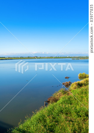 Tone River, near Tone Ozeki, upstream view, early autumn season Tone River, near Tone Ozeki, upstream view, early autumn season 83977835