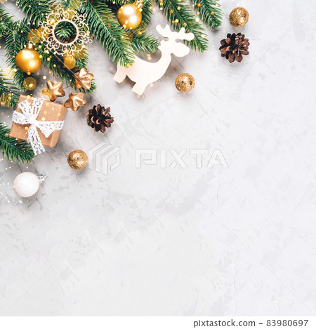 Christmas composition of fir tree branches and decorations. Christmas composition of fir tree branches and decorations. 83980697