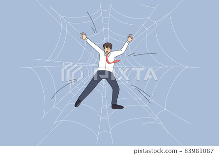 Worried businessman trapped in spider web  83981087