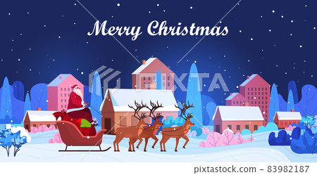 santa riding in sledge with reindeers happy new year merry christmas winter holidays concept night cityscape 83982187