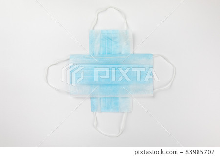 two blue surgical medical masks on white background 83985702