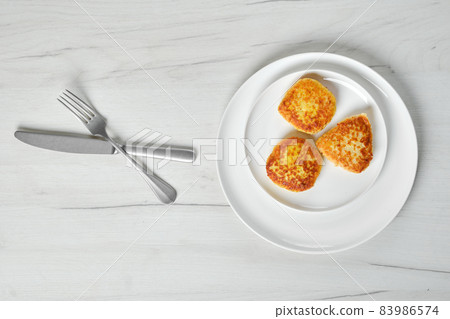 Top view of fried squid cutlet in breading 83986574