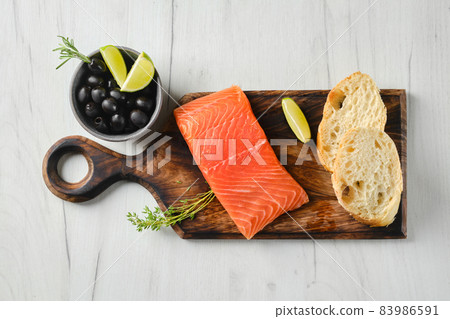 Top view of piece of fresh salmon steak Top view of piece of fresh salmon steak 83986591
