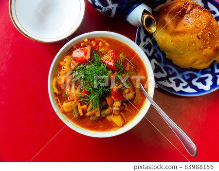 Traditional dish of Central Asian cuisine is Lagman Traditional dish of Central Asian cuisine is Lagman 83988156
