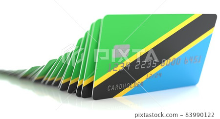 Domino effect with falling credit cards with flags of Tanzania. Conceptual 3d rendering 83990122